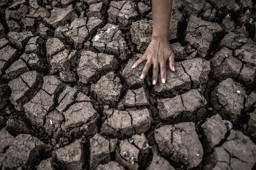 hands dry ground global warming water crisis